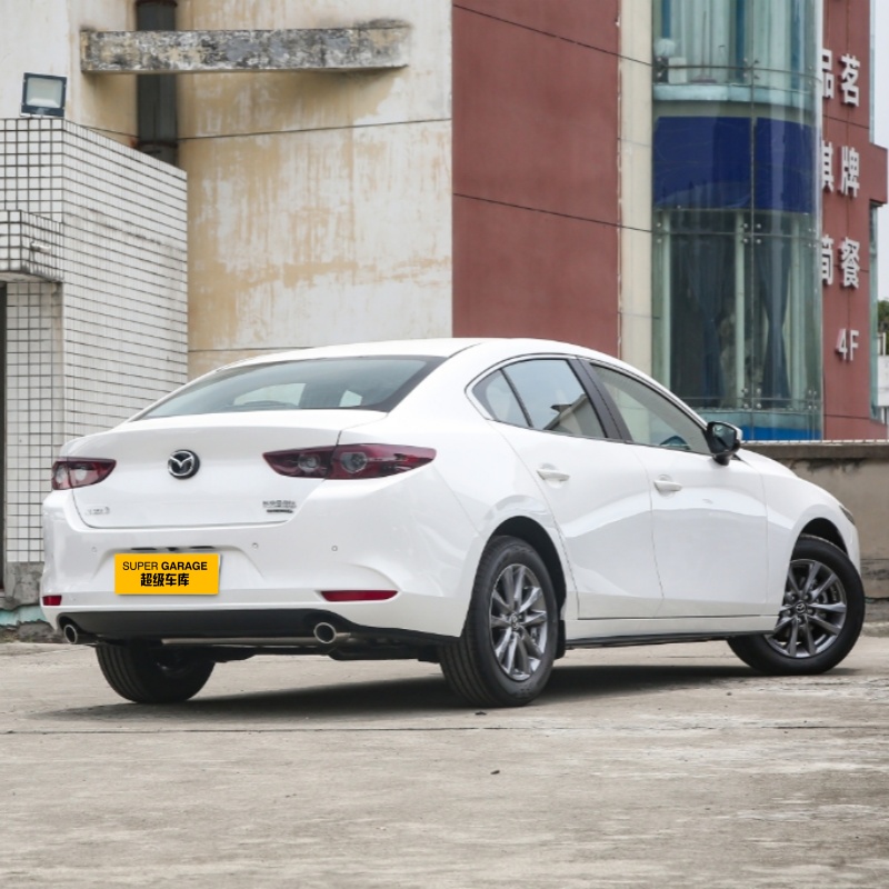 Мазда 3 Аксела